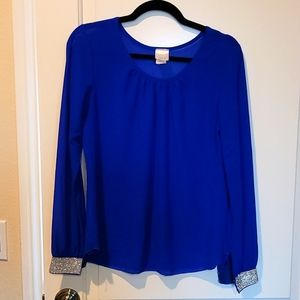 Royal blue blouse with rhinestone cuffs